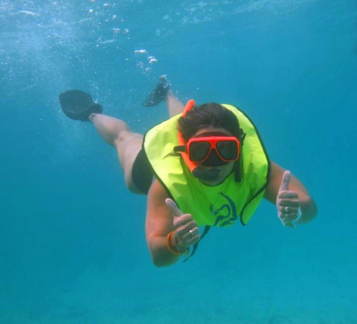 Diana, Business Development, goes snorkeling in the turquoise seas.