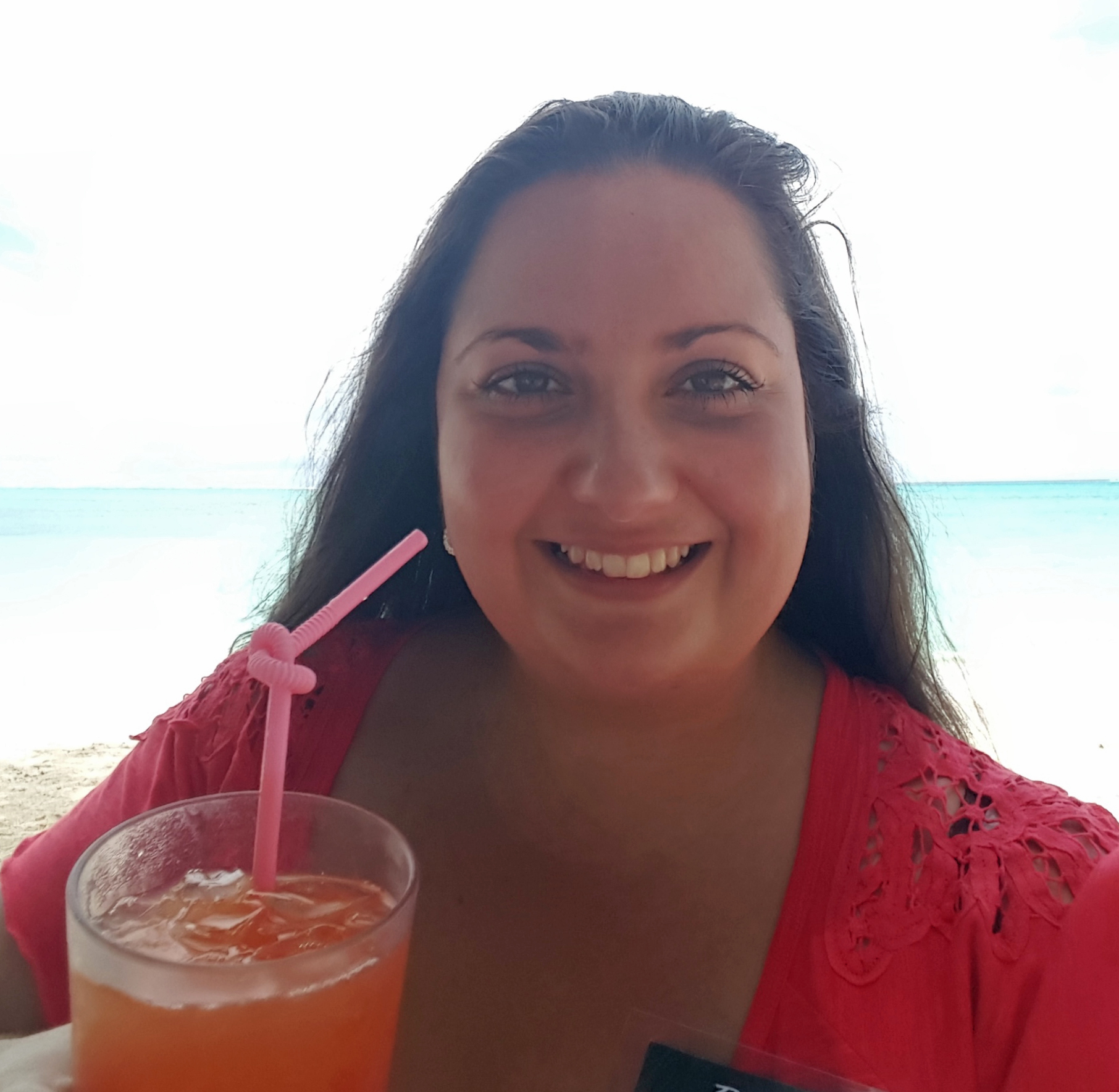 Melissa, Business Development, sips a rum punch from the Appleton Rum Bar.