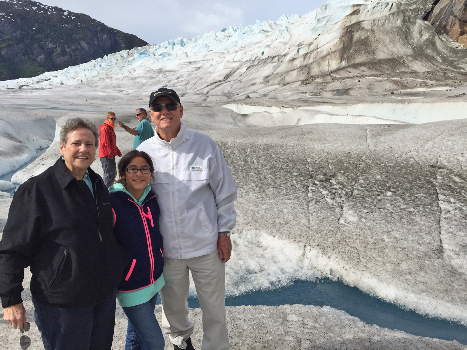 Cruise Planners Home Office Team member Cathy's daughter on a Holland America Line cruise to Alaska with her grandparents.
