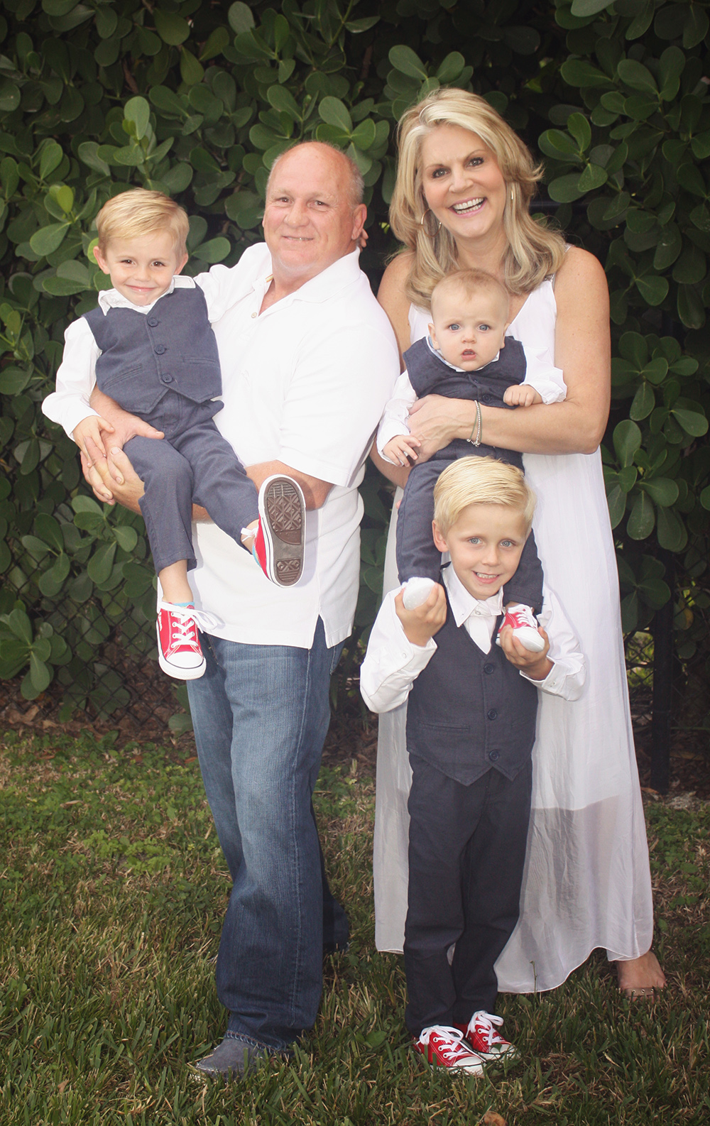 Cruise Planners CEO and co-founder Michelle Fee with husband Mark and their three grandchildren.